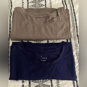 (2) a new day jersey spandex blend t shirts
